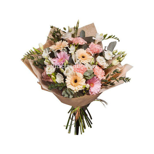 adorable floral  hand-tied bouquet full of fresh pink flowers by Inspired Flowers