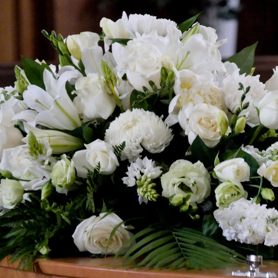 Floral confine arrangement with beautiful white flowers