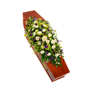 double ended coffin spray in cream and purple including gerbra