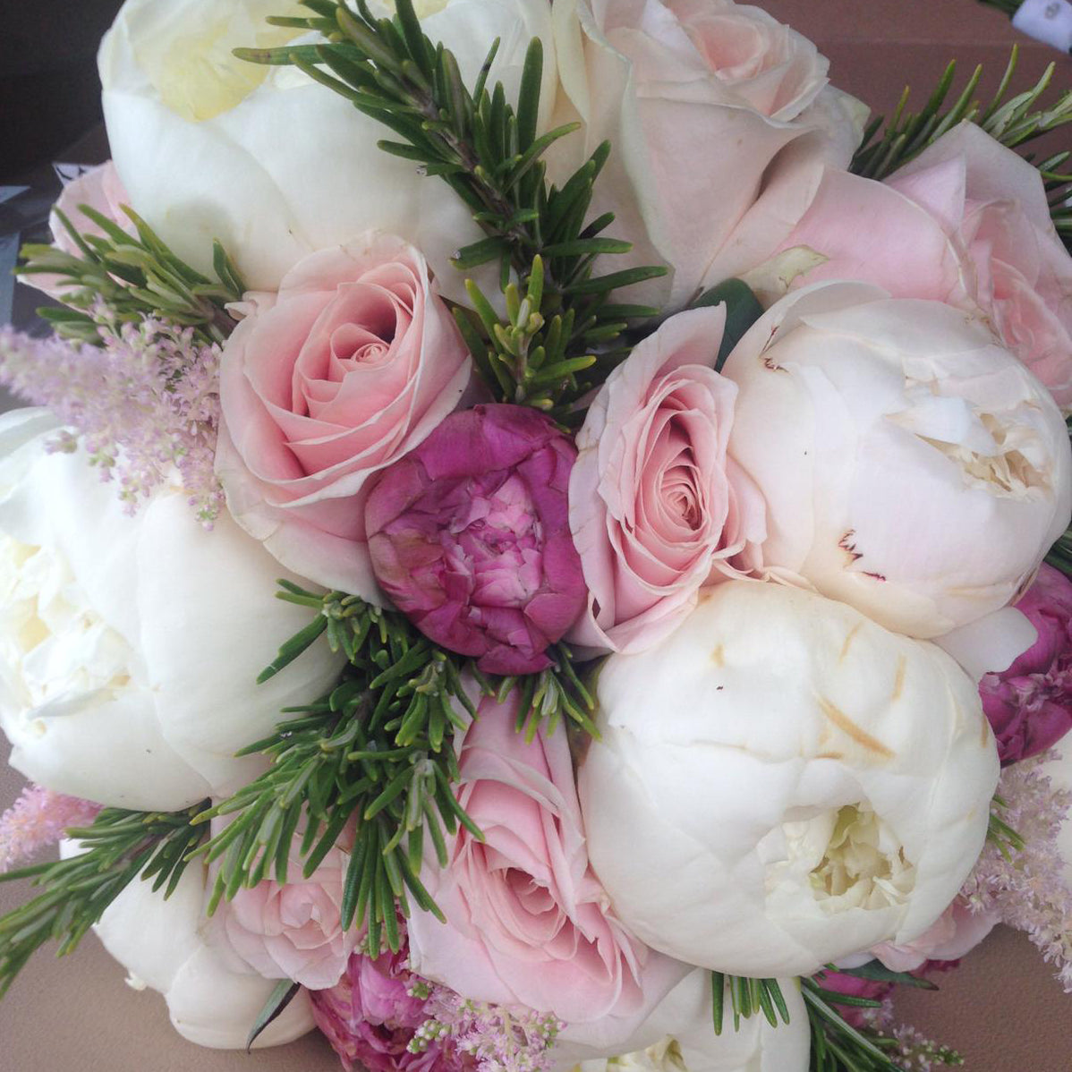 fresh peonies and roses with rosemary - copyright inspired flowers