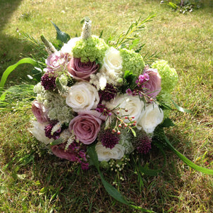 Wedding hand-tied floral arrangement in creams and pinks - copyright inspired flowers