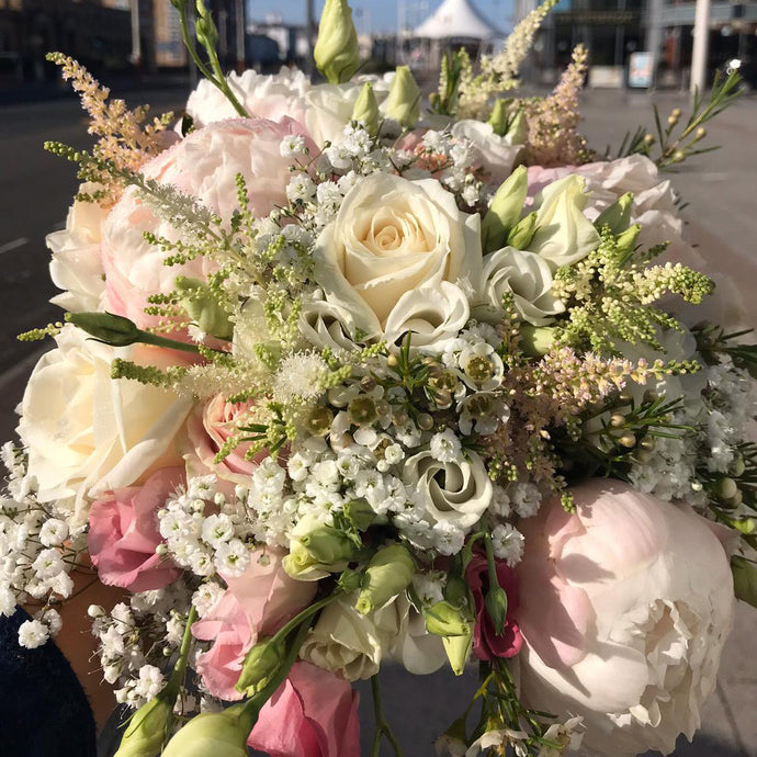 loose style hand help wedding bouquet in blush pinks and creams - copyright inspired flowers