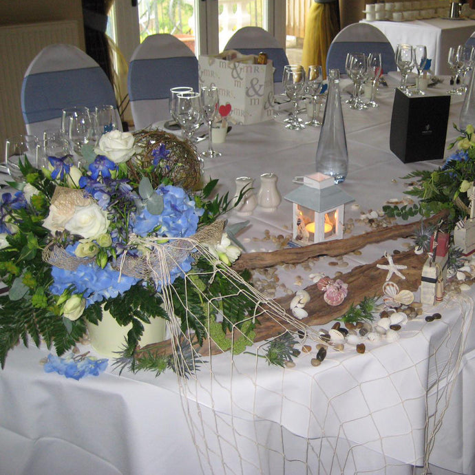 seaside floral arrangements for wedding - copyright inspired flowers