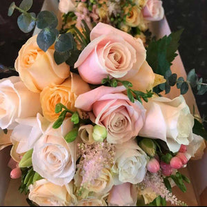 peach wedding flowers hand-tied