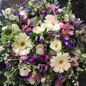 traditional floral funeral tribute made in southport