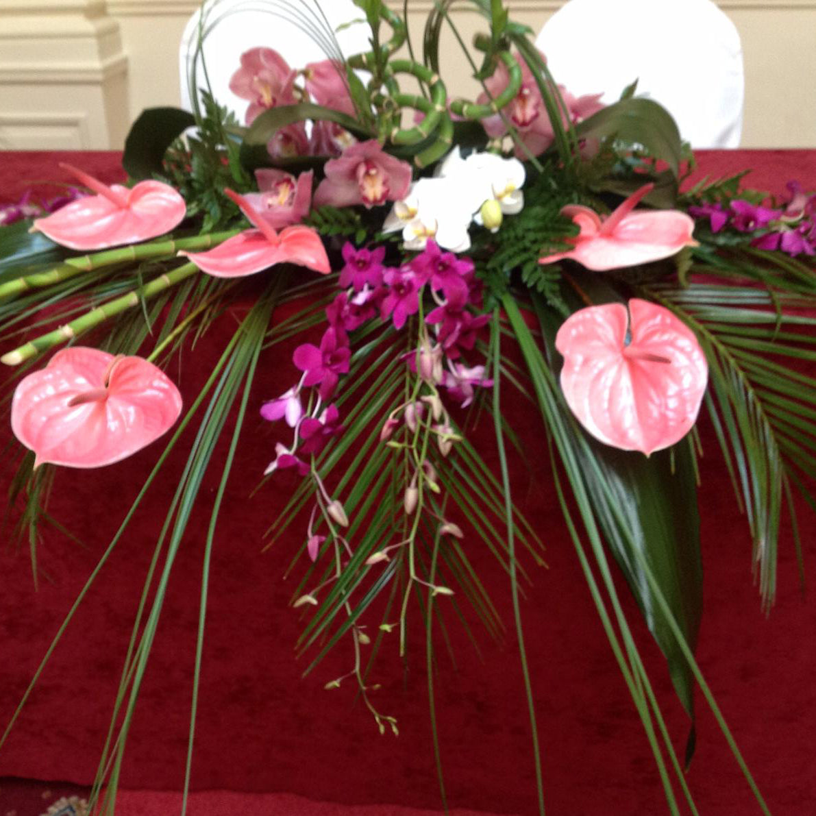 tropical floral display for a wedding ceremony - copyright inspired flowers