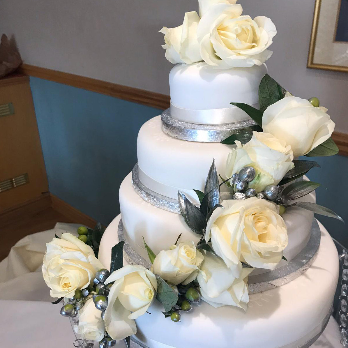 wedding cake with floral decoration - copyright inspired flowers