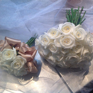 white rose bride and bridesmaid bouquet created by florist - copyright inspired flowers