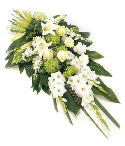 Mixed White Hand tied Floral Sheaf fresh blooms of lily gladioli chrysanthemums and bold foliage by Inspired Flowers 