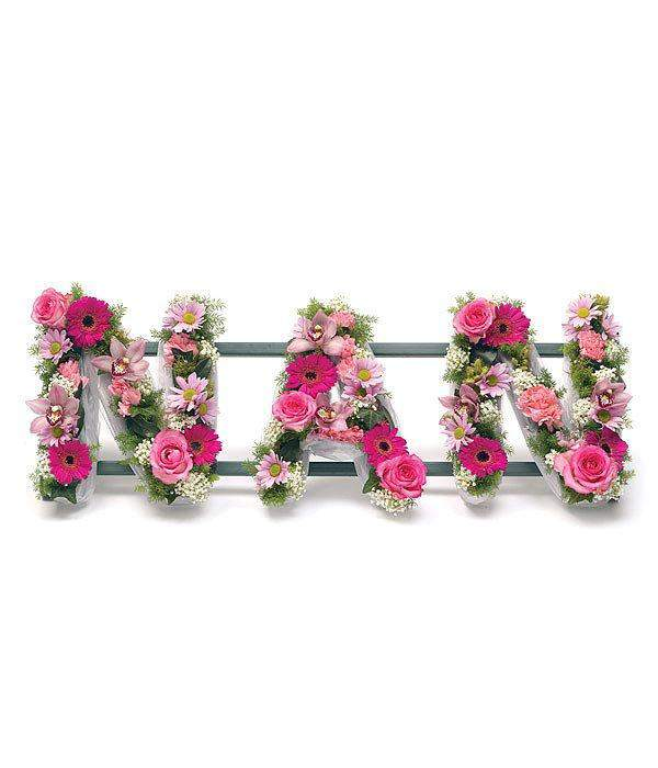 NAN Lettering Floral Tribute fresh dutch blooms including chrysanthemums rose and gerbra expertly arranged by florist by Inspired Flowers 