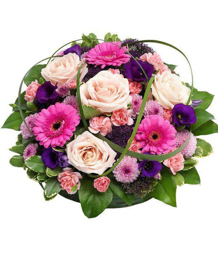 Pink Posy Pad Arrangement using fresh dutch flowers in pink and purple modern design arranged by florist by Inspired Flowers 