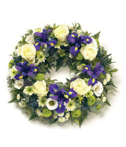 Purple & White Wreath traditional rose and iris floral arrangement with the freshest of dutch blooms by Inspired Flowers 