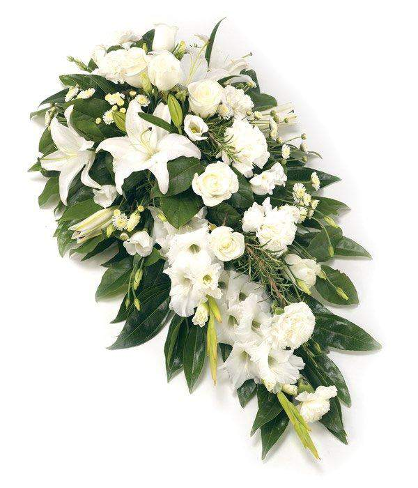 White Single Ended Spray A mix of the finest white stems such as Roses, Lilies, Gladioli, Lisianthus, Chrysanthemums and Carnations by Inspires Flowers