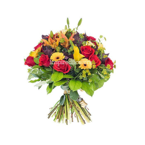 Bold beauty floral hand-tied bouquet packed with red and cerise fresh flowers by Inspired Flowers