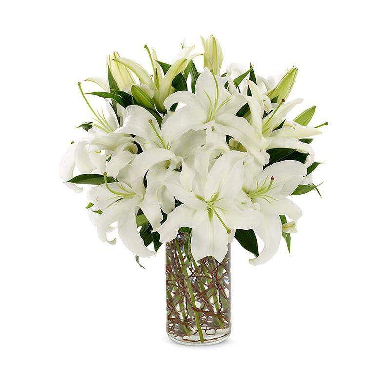Thinking of You Floral Hand-tied Bouquet mix of white lilies roses hypericum with seasonal foliage by Inspired Flowers 